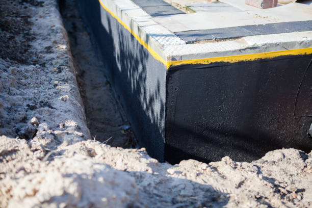 Professional Waterproofing technician working in Great Falls, SC